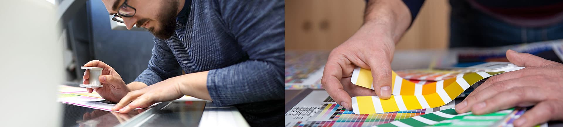 Print specialist inspecting colour quality with a magnifier